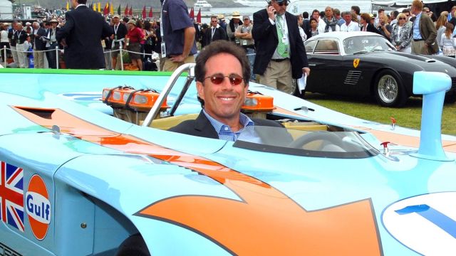 Jerry Seinfeld drives his vintage Porsche 917, made famous by the movie Le Mans, in Monterey Saturday, August 15, as part of the Monterey Historic car event. (Photo by Axel Koester/Corbis via Getty Images)