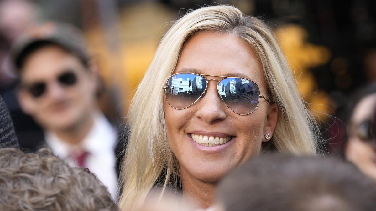 NEW YORK, NEW YORK - APRIL 04: U.S. Rep. Marjorie Taylor Greene (R-GA) walks through the crowd gathered outside the courthouse where former U.S. President Donald Trump will arrive later in the day for his arraignment on April 4, 2023 in New York City.