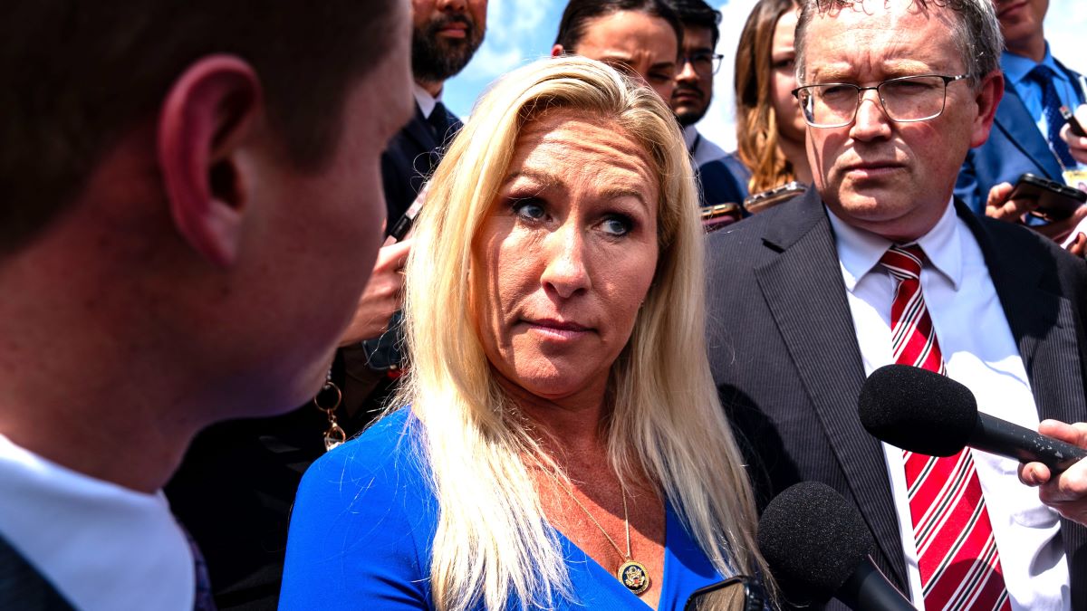 Rep. Marjorie Taylor Greene (R-GA) and Rep. Thomas Massie (R-KY) speak to members of the press on the steps of the House of Representatives after a meeting with Speaker of the House Mike Johnson (R-LA) at the U.S. Capitol on May 7, 2024 in Washington, DC. Last week Greene threatened to move forward with a 'motion to vacate' over her dissatisfaction with the Speaker's handling of the government funding legislation.