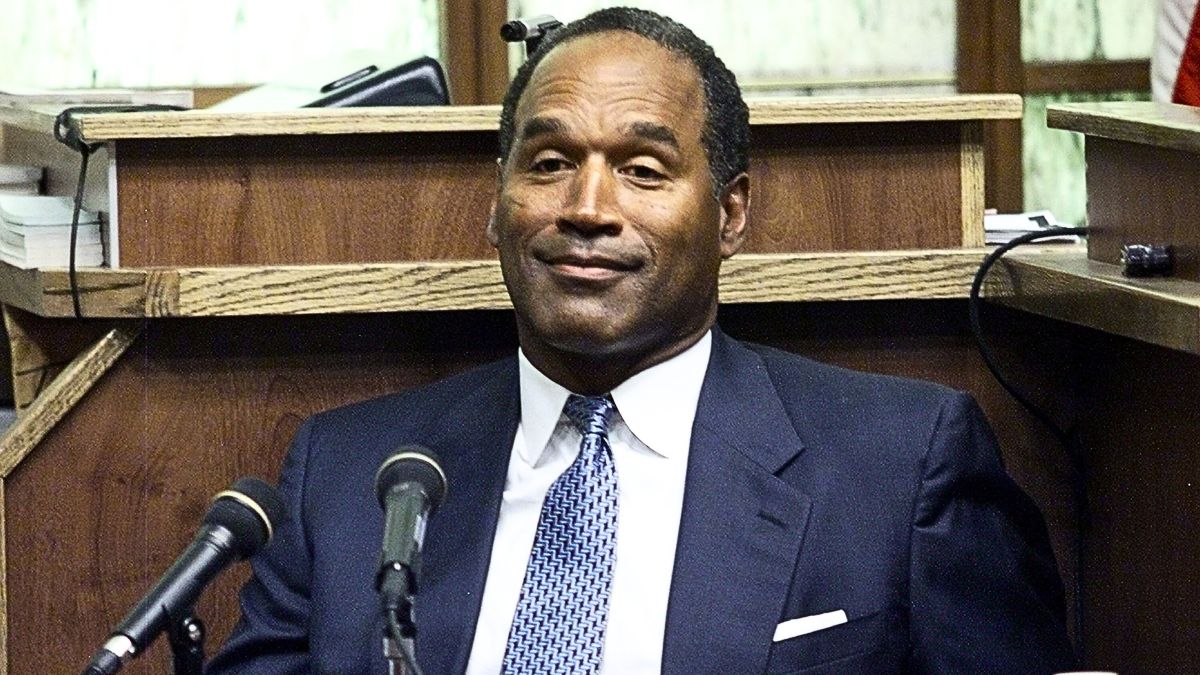 Former NFL star and actor O.J. Simpson testifies in Miami-Dade County Court during the third day of his "road rage" trial October 23, 2001 in Miami, Florida.