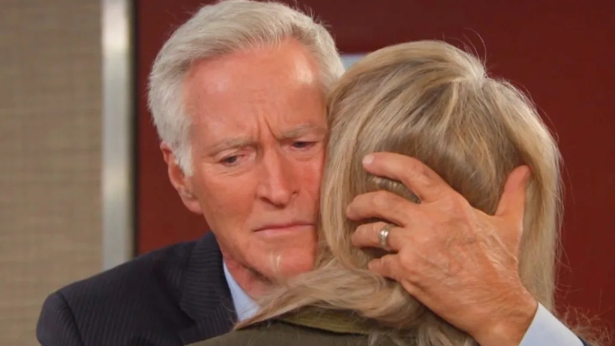 Drake Hogestyn as John Black hugging Marlena in Days of Our Lives.