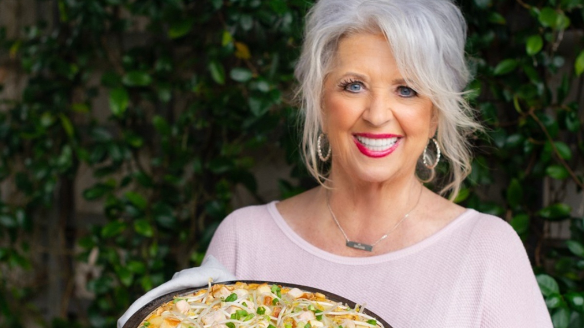 Paula Deen holding up a dish