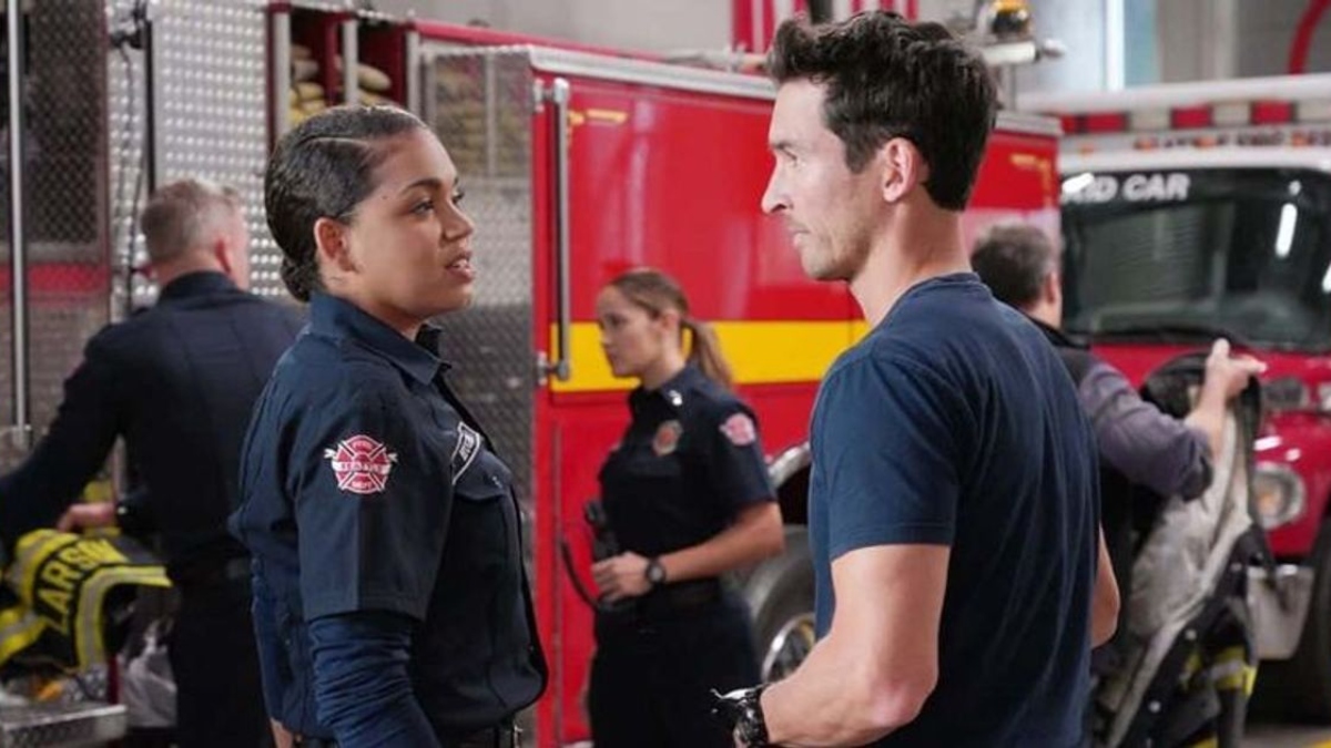 Vic (Barrett Doss) and Travis (Jay Hayden) on Station 19