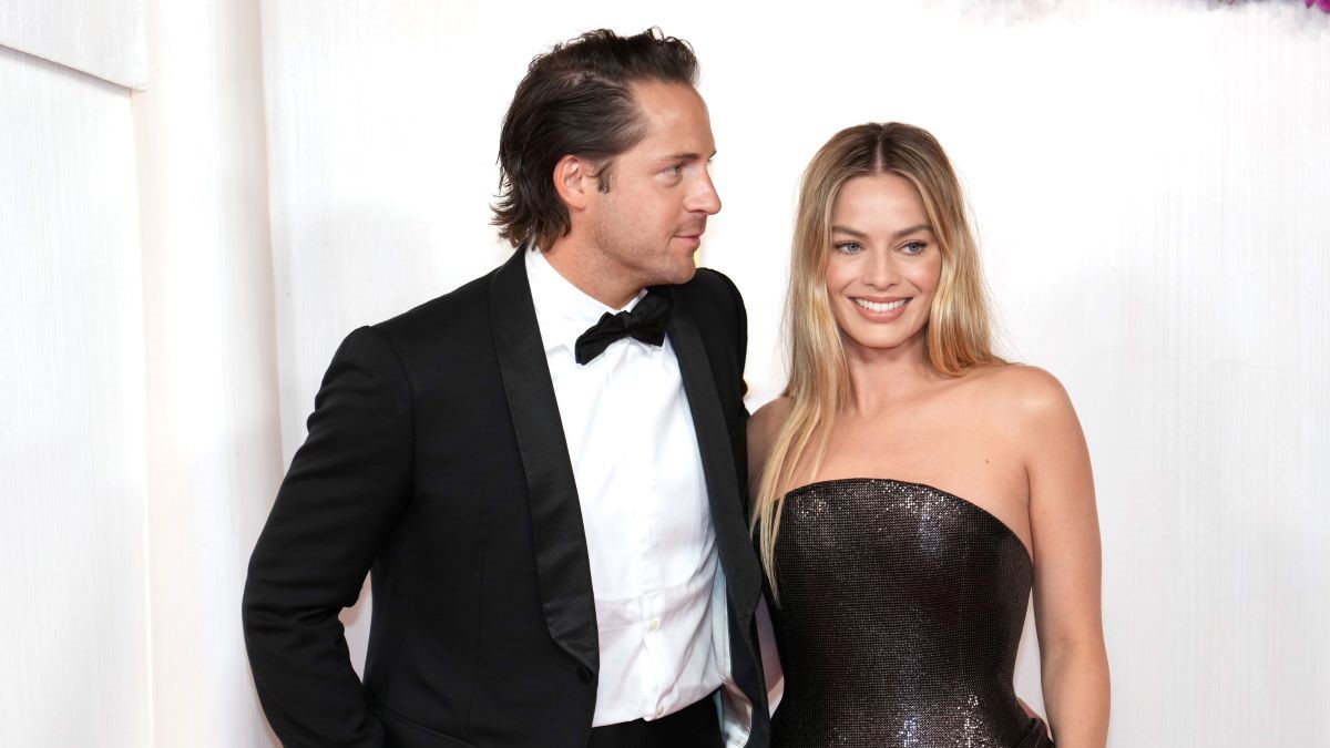 HOLLYWOOD, CALIFORNIA - MARCH 10: Tom Ackerley and Margot Robbie attend the 96th Annual Academy Awards at Dolby Theatre on March 10, 2024 in Hollywood, California. (Photo by Jeff Kravitz/FilmMagic)