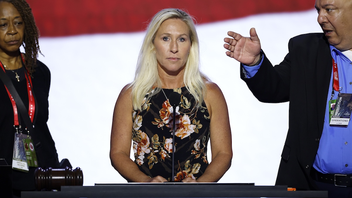 Rep. Marjorie Taylor Greene (R-GA) stands onstage ahead of the start of the first day of the Republican National Convention