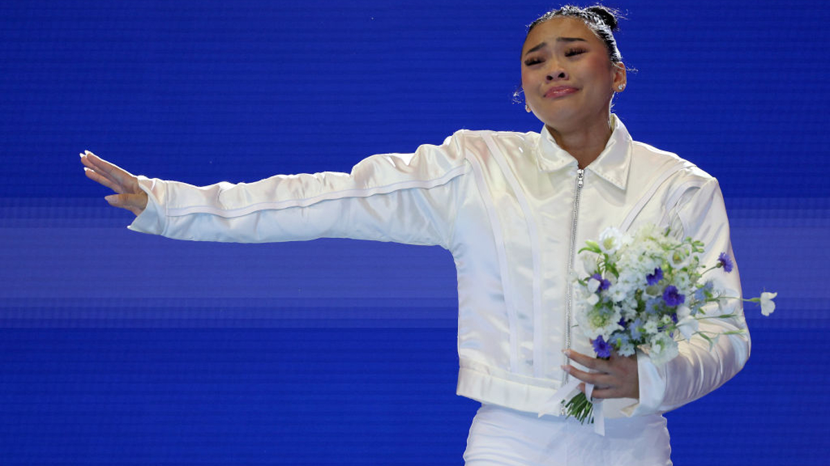 Suni Lee reacts after being selected for the 2024 U.S. Olympic Women's Gymnastics Team on Day Four of the 2024 U.S. Olympic Team Gymnastics Trials at Target Center on June 30, 2024 in Minneapolis, Minnesota. 