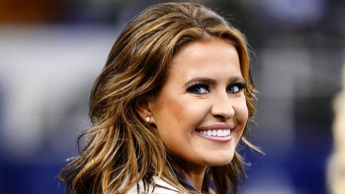 Caroline Sundvold smiling while cheering