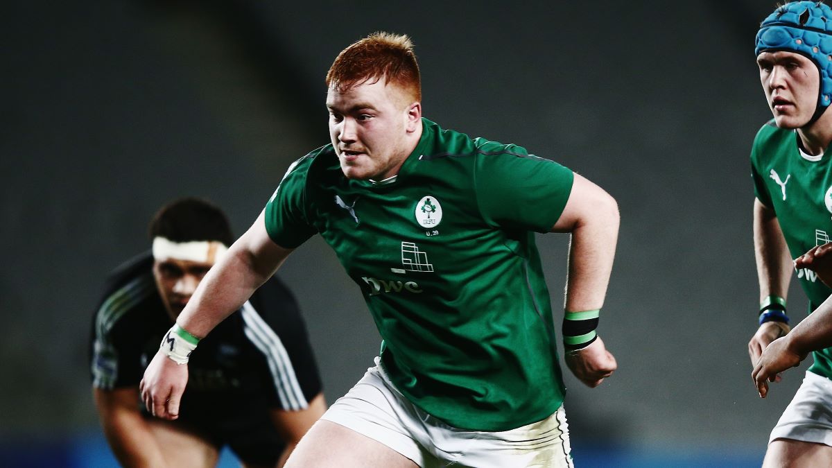 Rory Burke of Ireland kicks the ball through to score a try during the 2014 Junior World Championship 3rd Place play-off match between New Zealand and Ireland at Eden Park on June 20, 2014 in Auckland, New Zealand. (Photo by Hannah Peters/Getty Images)