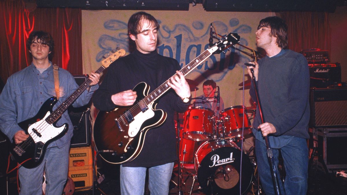 Photo of Liam GALLAGHER and Paul 'Bonehead' ARTHURS and Paul 'Guigsy' McGUIGAN and OASIS, L-R: Paul 'Guigsy' McGuigan, Paul 'Bonehead' Arthurs, Tony McCarroll, Liam Gallagher - performing live onstage at The Water Rats (Photo by Ian Dickson/Redferns)