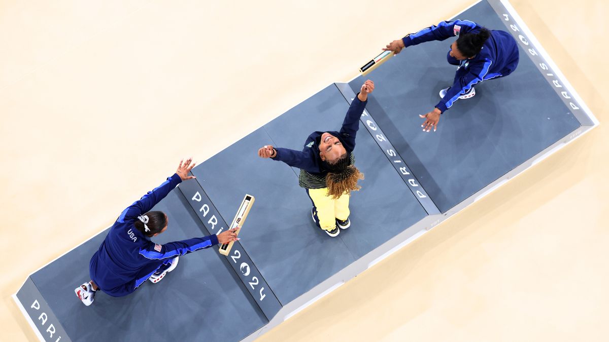 Gold medalist Rebeca Andrade (C) of Team Brazil, silver medalist Simone Biles (R) of Team United States and bronze medalist Jordan Chiles (L) of Team United States celebrate on the podium at the Artistic Gymnastics Women's Floor Exercise Medal Ceremony on day ten of the Olympic Games Paris 2024 at Bercy Arena on August 05, 2024 in Paris, France.