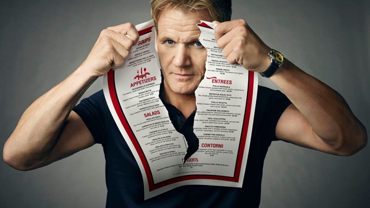 Gordon Ramsay ripping up a menu for a promotional image for 'Kitchen Nightmares'