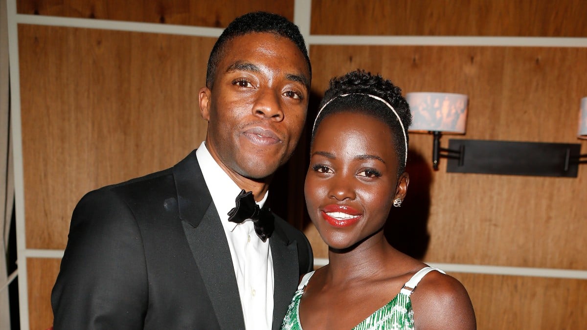 Lupita Nyong'o and Chadwick Boseman attend the 2014 Vanity Fair Oscar Party