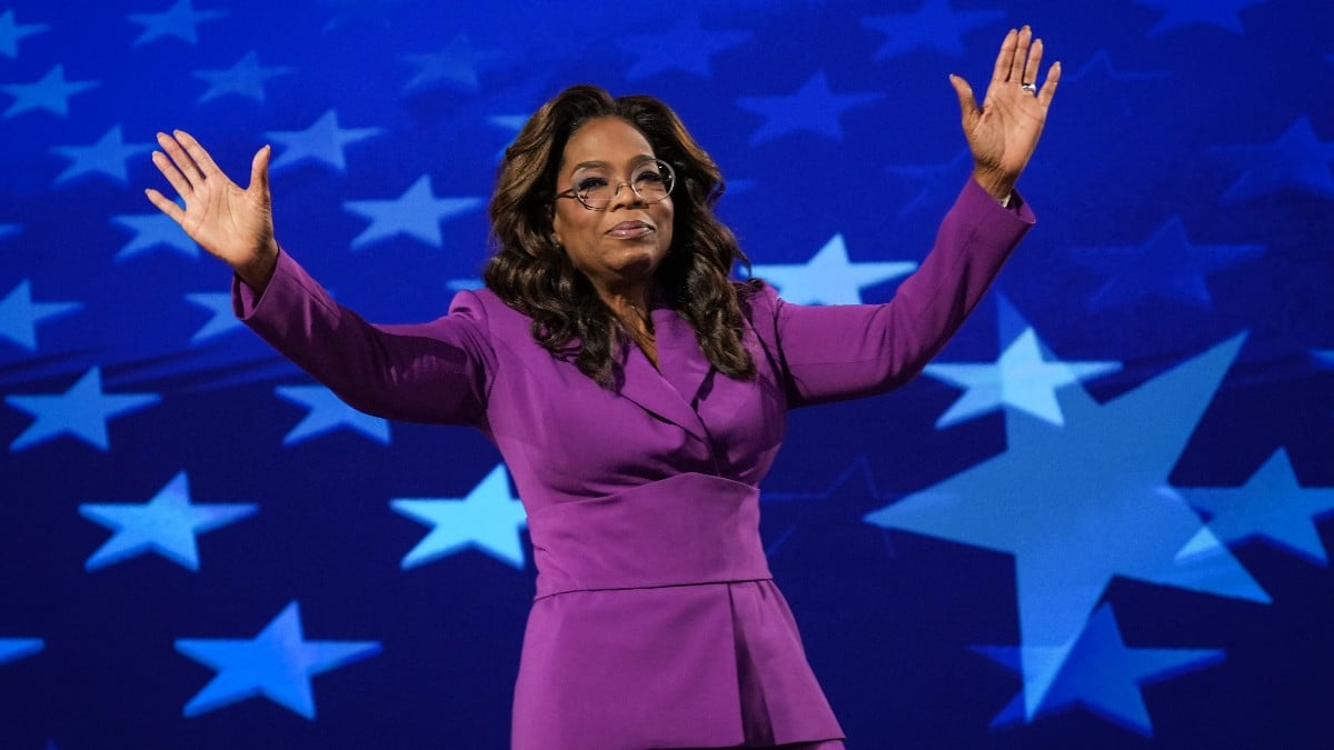 Oprah Winfrey departs after speaking on stage during the third day of the Democratic National Convention