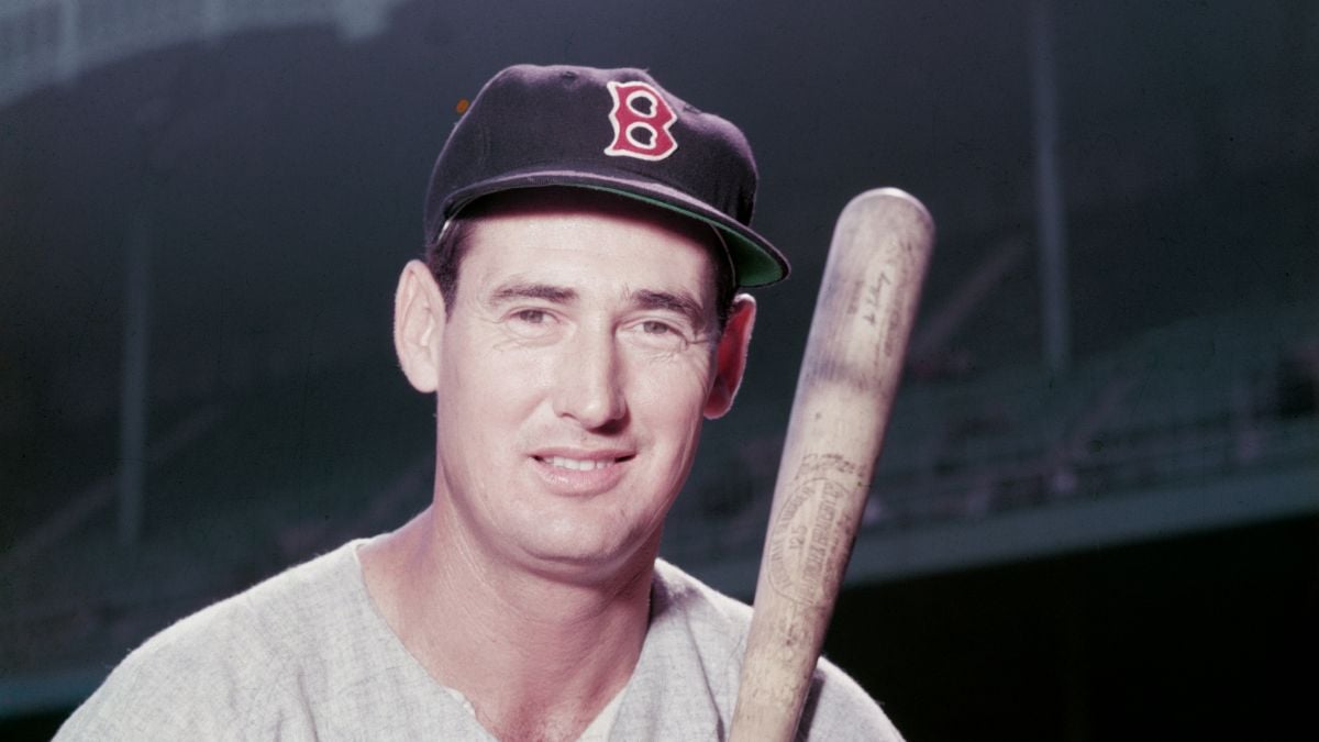 Portrait of American baseball player Ted Williams (1918 - 2002), aka 'The Splendid Splinter,' wearing his Boston Red Sox uniform and holding a bat. (Photo by Hulton Archive/Getty Images)