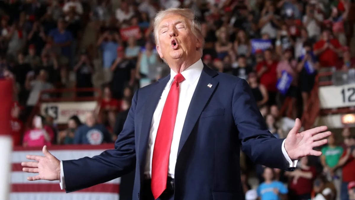 Donald Trump talking in front of a crowd