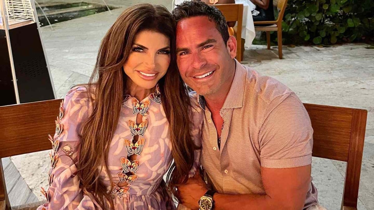 Teresa Giudice and Luis Ruelas sitting together and smiling