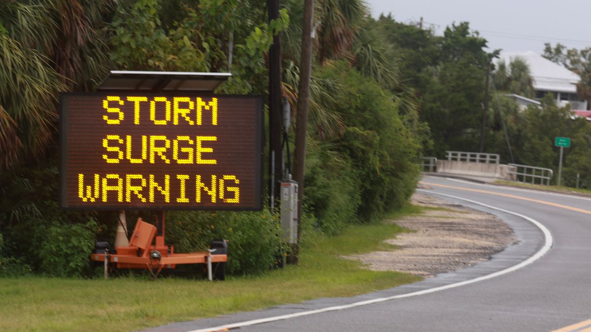 A sign warning of storm surges